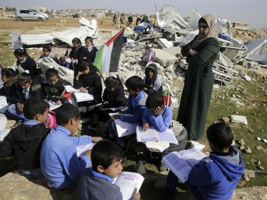 Bedouin-children-attend-improvised-class-in-the-village-of-Abu-Nuwar-West-Bank-after-the-Israeli-army-demolished-their-two-classroom-school-in-the-West-Bank-in-February-2016-AP-